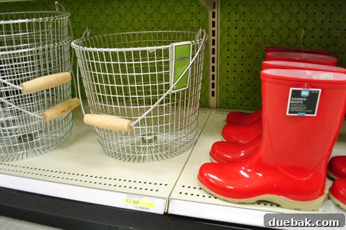 Garden items including woven baskets and colorful rain boots, suitable for outdoor use and decor.
