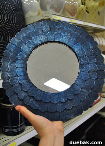 Blue-stained wooden mirror with a rustic finish, ideal for gallery walls or adding a unique touch to home decor.