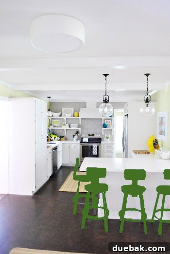 Photoshop rendering of kitchen bar stools painted in a deeper emerald green color.