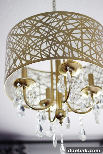 Elegant new lighting fixture and bespoke furnishings in a modern tween room