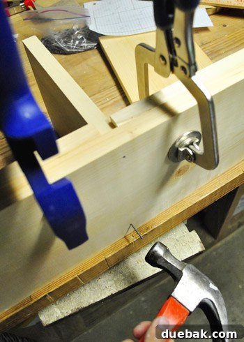 Nailing dollhouse wall into the floor panel from below