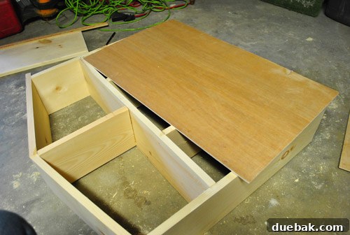 Plywood sheet being cut for the dollhouse back panel