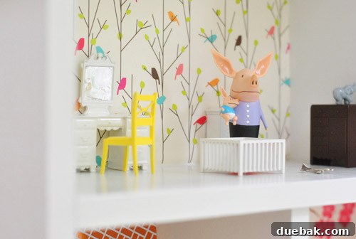 Pint-Sized Palaces: Decorating Your Dollhouse 16 Close Up Of Pig Dolls In Nursery Room In DIY Dollhouse Build