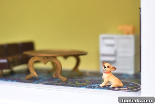 Pint-Sized Palaces: Decorating Your Dollhouse 23 Chihuahua toy in DIY Dollhouse