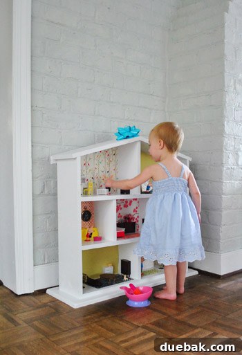 Pint-Sized Palaces: Decorating Your Dollhouse 27 Toddler Girl Playing With Dollhouse Made By Parents