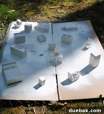 Pint-Sized Palaces: Decorating Your Dollhouse 10 Small Dollhouse Furniture Spray Painted White On Cardboard