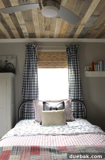 Close-up of the Benjamin Moore Thunder wall color and painted furniture, showcasing the sophisticated palette.