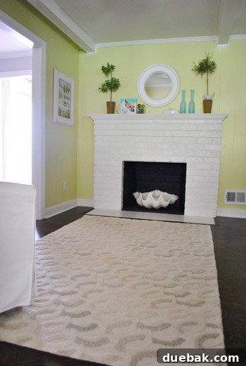 The Pottery Barn office rug appeared dingy compared to the kitchen's white surfaces