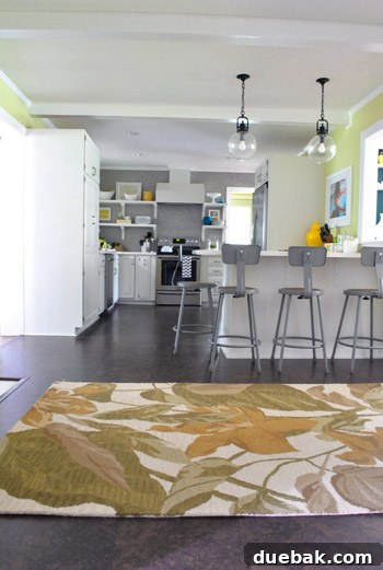 The Pottery Barn 'Clara' rug from the old den, featuring a distinct pattern