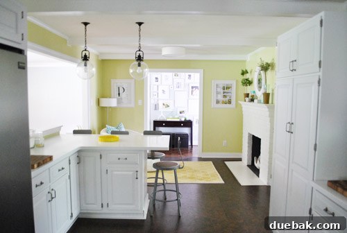 The yellow Moorish rug, though sophisticated, showed a clash with the kitchen's avocado walls