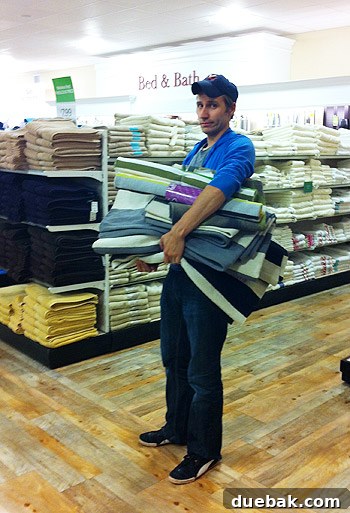 A collection of various flat weave rugs gathered for a kitchen rug fashion show