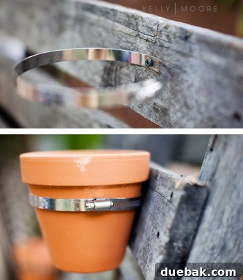 House Crashing: Kelly's Outdoor Escape Revealed 7 DIY leaning pallet planter adorned with potted plants and garden tools