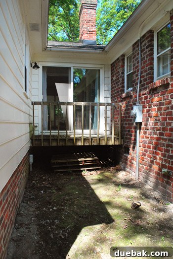 Reclaiming Space: From Balcony to Spacious Deck 2 Old, decaying balcony attached to a house, awaiting demolition