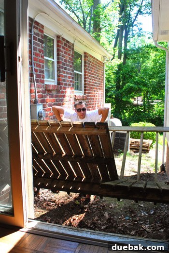 Reclaiming Space: From Balcony to Spacious Deck 4 The old balcony structure dramatically twisting and detaching from the house wall