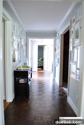 Old view of bedroom from hallway, showing side of the bed