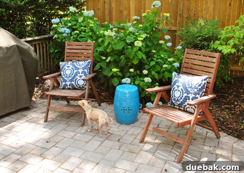 Bringing a Pop of Color to Our Side Patio with Red Adirondacks 7 Old, faded Ikea folding chairs on a patio