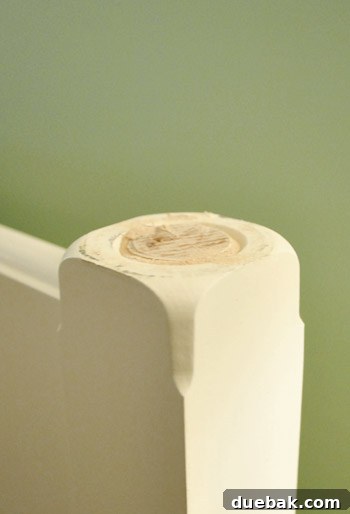 Surprising detail: The cleanly cut top of a bedpost revealing a natural circular pattern, looking like a decorative design.