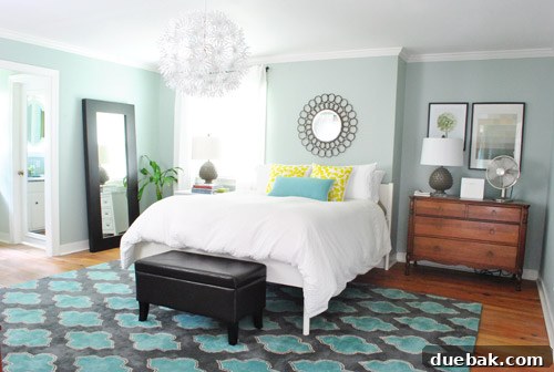 Final reveal: Ed the bed fully made, with its newly trimmed posts, appearing as if it was always designed this way.