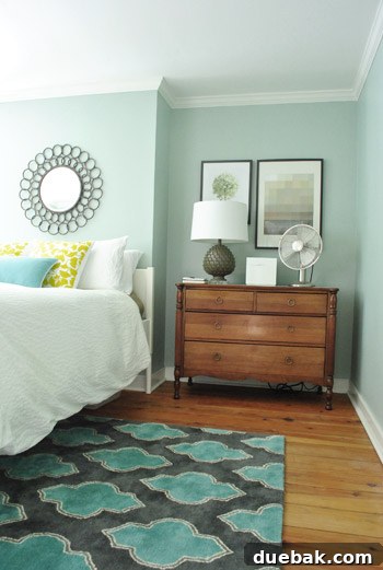 Charming detail: A hand-me-down dresser from John's parents, perfectly fitted into a bedroom nook.
