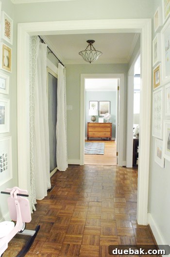 Hallway view: The bedroom entrance showing the inviting glimpse of the newly arranged space.