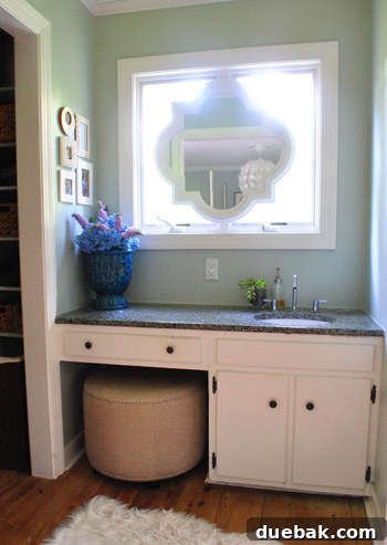 Morning sun: Sunlight streaming through the window above the sink, illuminating the room.