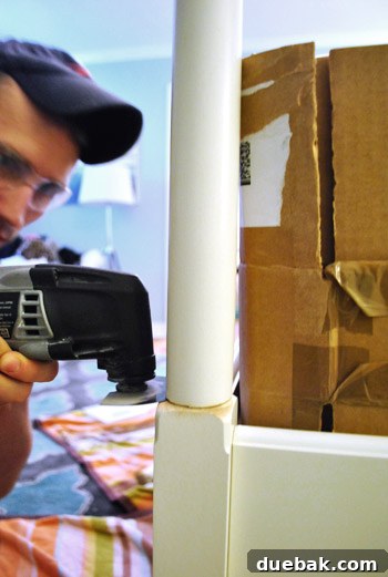 Step-by-step: Using a Dremel Multimax with a wood cutting attachment to carefully trim one of the bedposts.