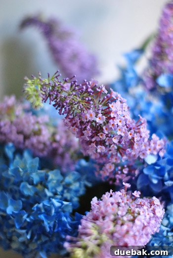 Every Year, A New Frame 16 Method for arranging garden flowers: a small vase propped on a cardboard box inside a larger planter