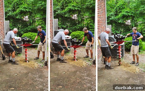 Operating the two-man auger to dig post holes
