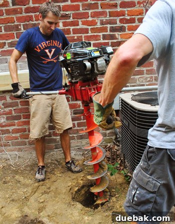 Another focused expression while auger digging