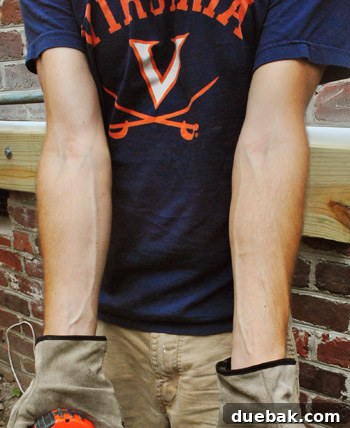 Man's arm with bulging veins after auger use