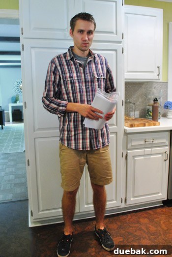 Homeowner in a relaxed outfit for the revised plan meeting