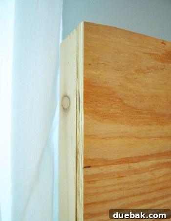 Close-up view of the headboard side, showing how the 1x3 board wraps around to hide the bed post