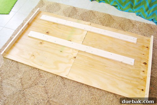 The fully assembled headboard frame, viewed from the back, ready for upholstery