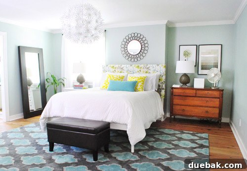 The Evolving Sanctuary 15 Master bedroom featuring a newly upholstered DIY headboard, adding comfort and style