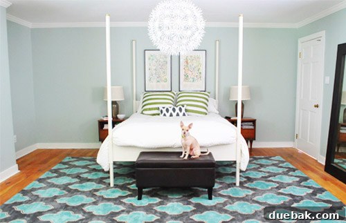 The Evolving Sanctuary 9 Master bedroom with new rug from an outlet and botanical prints inside bedposts