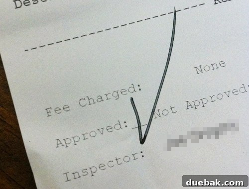 An official inspection document stamped with 'APPROVED' for deck footings, signifying project success.