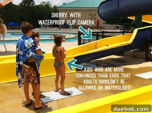Katie B filming at a pool with a waterproof camera case