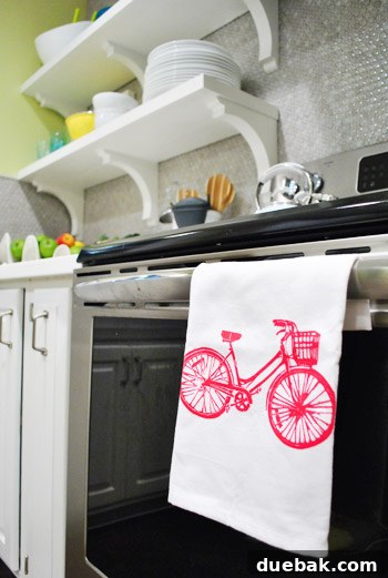 Fathers Day Fun with Furry Friends and Big Grins 5 Kitchen dishtowel featuring a stylish bicycle design, a thoughtful Father's Day gift for a home enthusiast