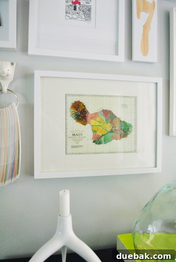 Fathers Day Fun with Furry Friends and Big Grins 10 Detailed shot of the framed Maui map, highlighting its design and placement within the hallway