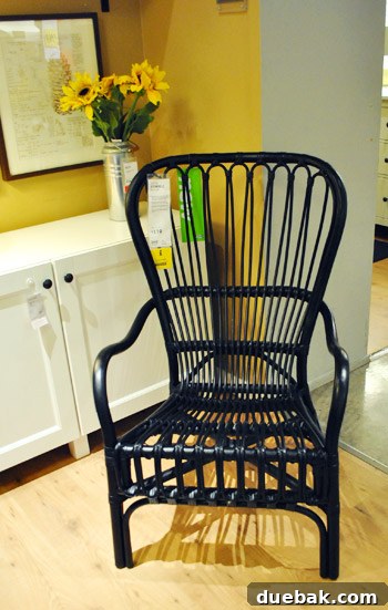 Elegant black Storsele rattan armchair, perfect for modern and bohemian interiors