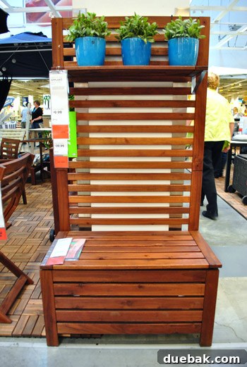 Applaro potting/storage bench with colorful blue planters, ideal for garden organization