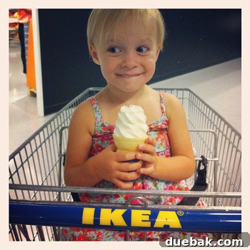 Clara enjoying an ice cream cone after an IKEA shopping trip