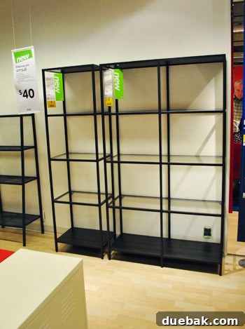 Black Vittsjo nesting tables with glass tops, versatile for various home decor styles
