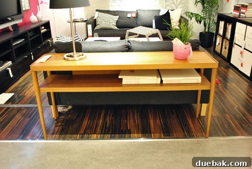 Stockholm sofa table with mid-century modern design and tapered legs