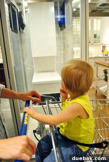 IKEA kitchen durability demonstration, featuring cabinet drawers opening and closing repeatedly