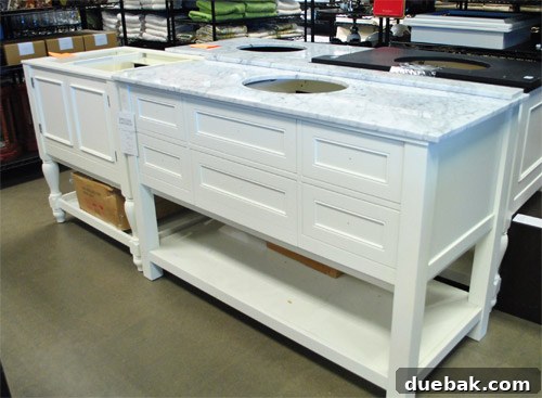 A large, luxurious bathroom vanity with a basin and mirror.