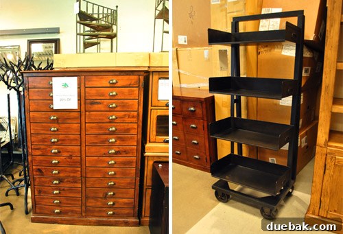 An industrial printer's armoire and metal rolling shelves.