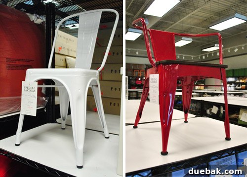 Two metal chairs, one white adult-sized and one red child-sized.