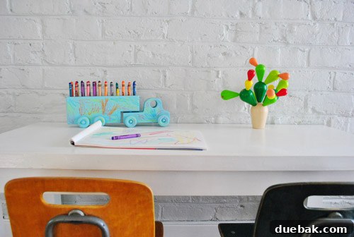 Woodland Crayon Express 6 Child's drawing desk featuring the crayon-filled, decorated toy truck