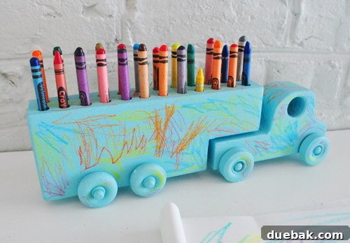 Woodland Crayon Express 7 Close-up of crayons neatly stored inside the decorated toy truck's compartments